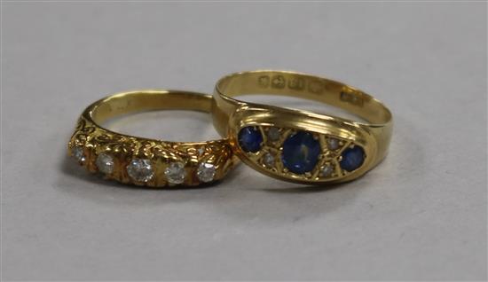An Edwardian 18ct gold, sapphire and diamond ring and an 18ct gold and five stone diamond ring.